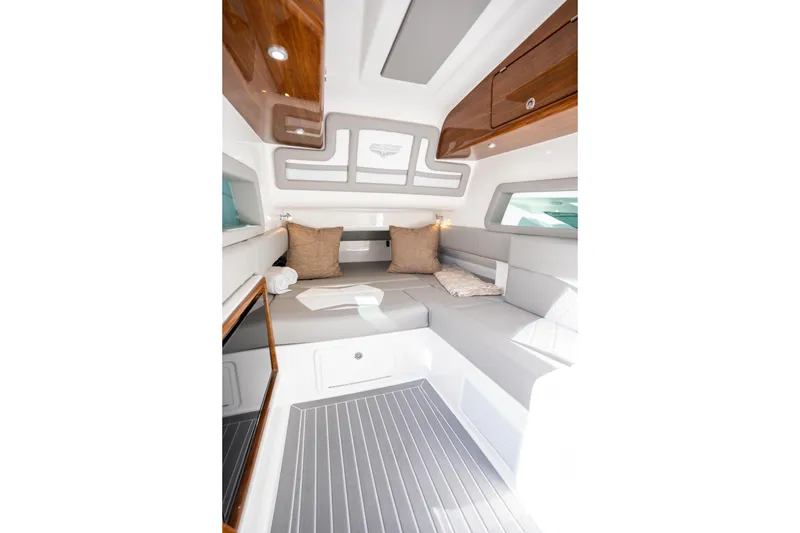 Slide: The Image of Luxurious interior of 2026 Deep Impact 499 Sport Luxury Edition boat cabin. - 66