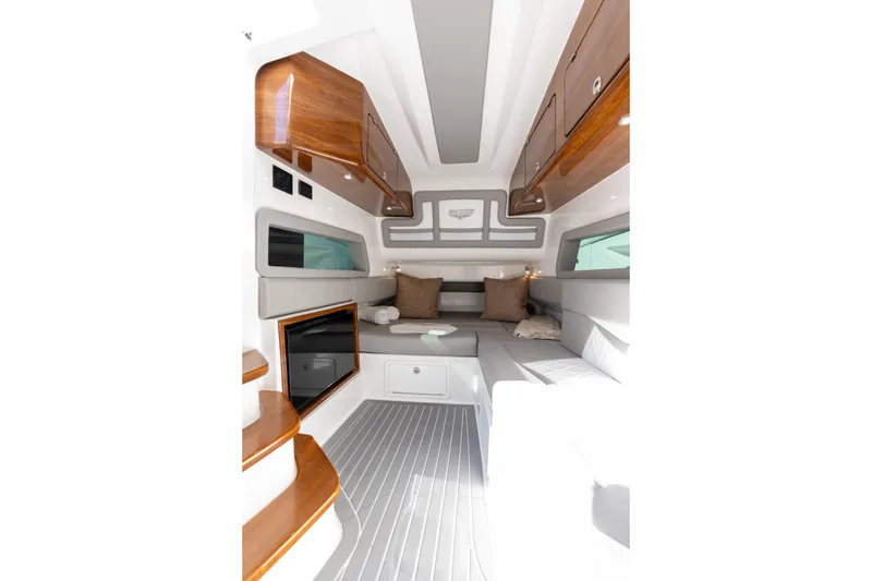 Slide: The Image of Luxurious interior of 2026 Deep Impact 499 Sport Luxury Edition boat cabin. - 67