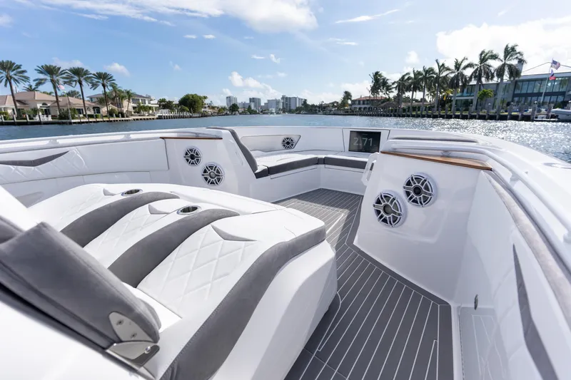 Slide: The Image of Luxurious interior of 2026 Deep Impact 499 Sport boat with elegant seating and waterfront view. - 70