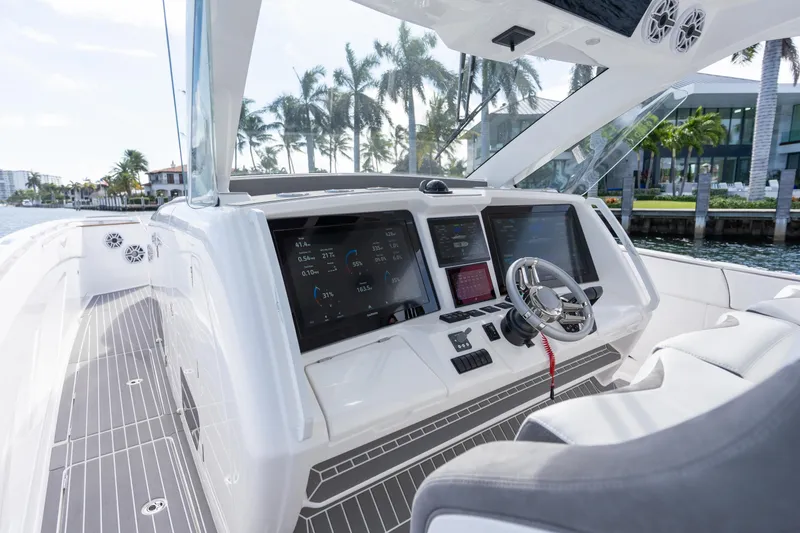 Slide: The Image of Luxury boat cockpit of 2026 Deep Impact 499 Sport, featuring advanced navigation systems. - 72
