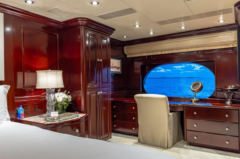 Slide: The Image of Luxurious 2007 Christensen Tri-Deck yacht interior with elegant wood finish and ocean view. - 12