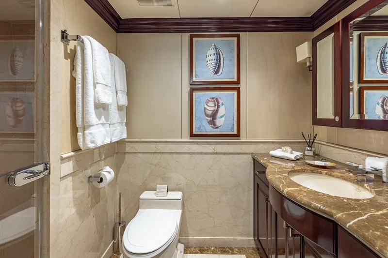 Slide: The Image of Luxurious bathroom on 2007 Christensen Tri-Deck yacht with marble countertop and elegant decor. - 20