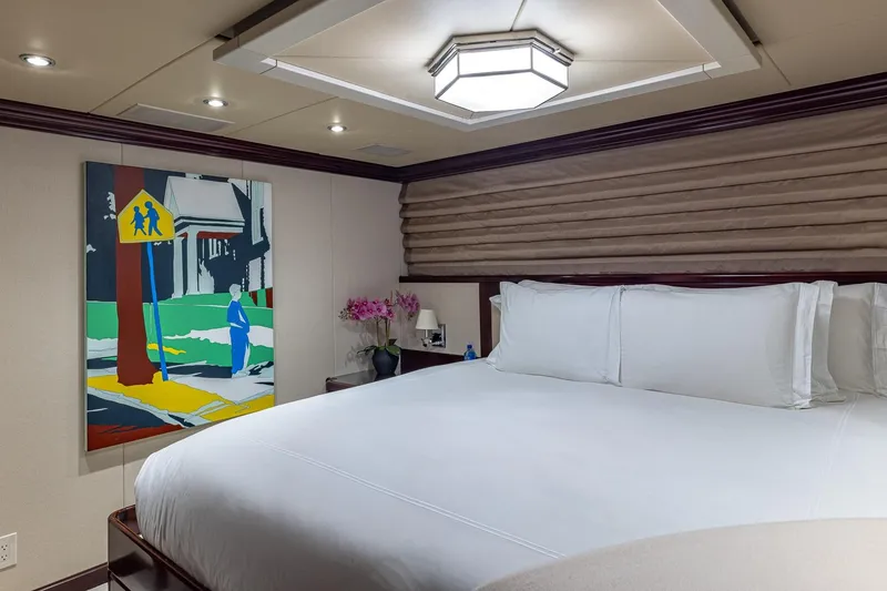 Slide: The Image of Luxurious bedroom on 2007 Christensen Tri-Deck yacht with modern art and elegant decor. - 21