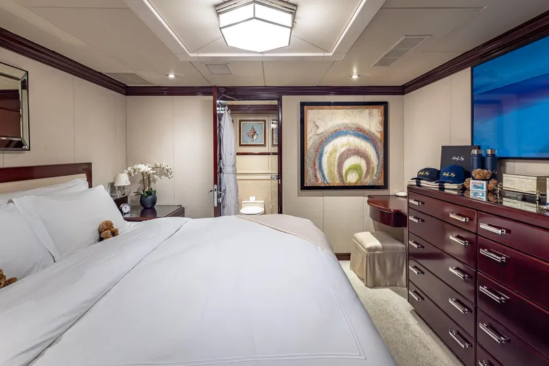 Slide: The Image of Luxurious bedroom on 2007 Christensen Tri-Deck yacht with elegant decor and modern amenities. - 24