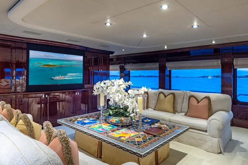 Slide: The Image of Luxurious 2007 Christensen Tri-Deck yacht interior with elegant seating and ocean view. - 3