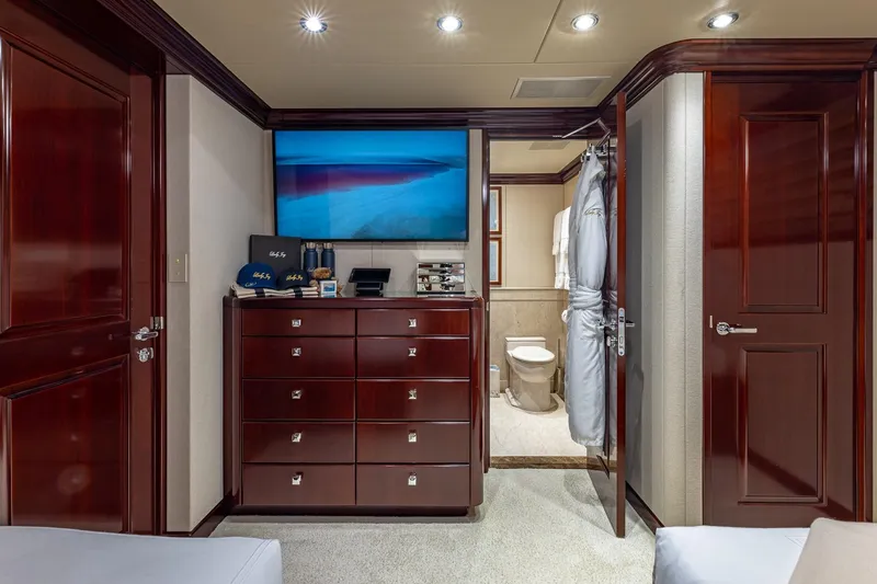 Slide: The Image of Luxurious 2007 Christensen Tri-Deck yacht interior with elegant wood finishes and modern amenities. - 31