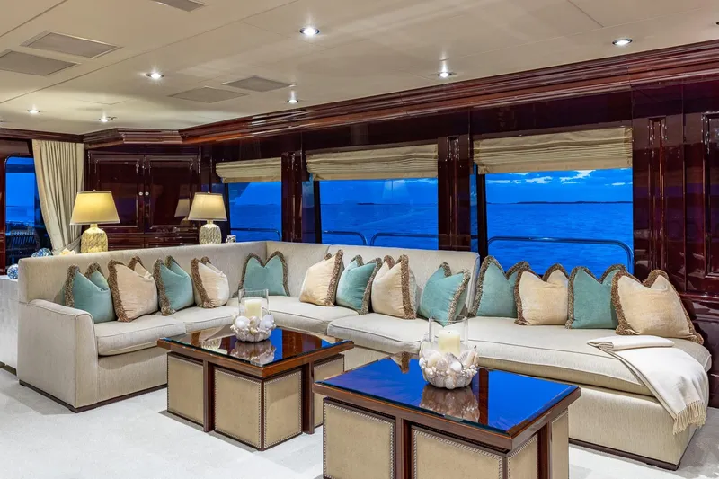 Slide: The Image of Luxurious 2007 Christensen Tri-Deck yacht interior with elegant seating and ocean view. - 33