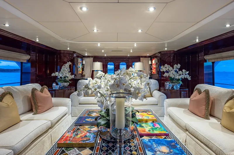 Slide: The Image of Luxurious interior of 2007 Christensen Tri-Deck yacht with elegant seating and floral decor. - 4