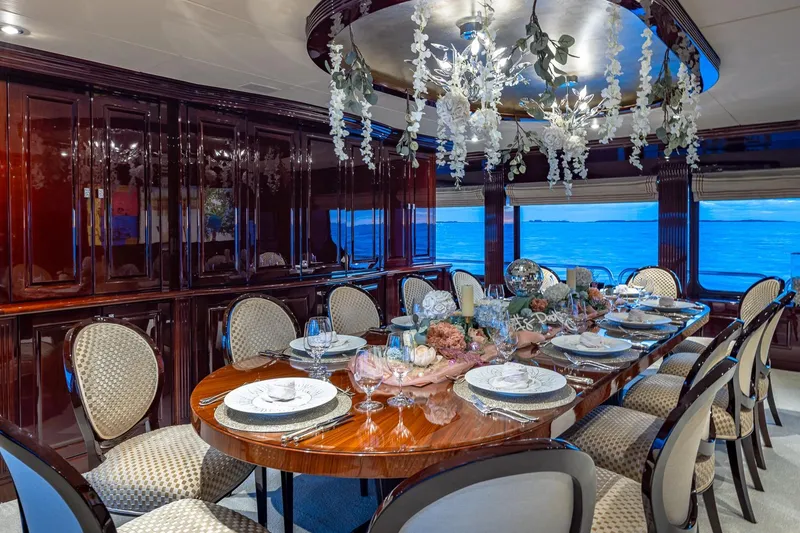 Slide: The Image of Luxurious dining room on 2007 Christensen Tri-Deck yacht with elegant decor and ocean view. - 7