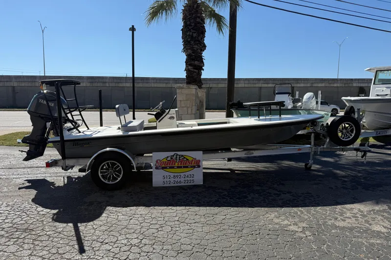 The Image of 2026 Maverick 17 HPX-S boat on trailer, parked outdoors under clear sky. - 0