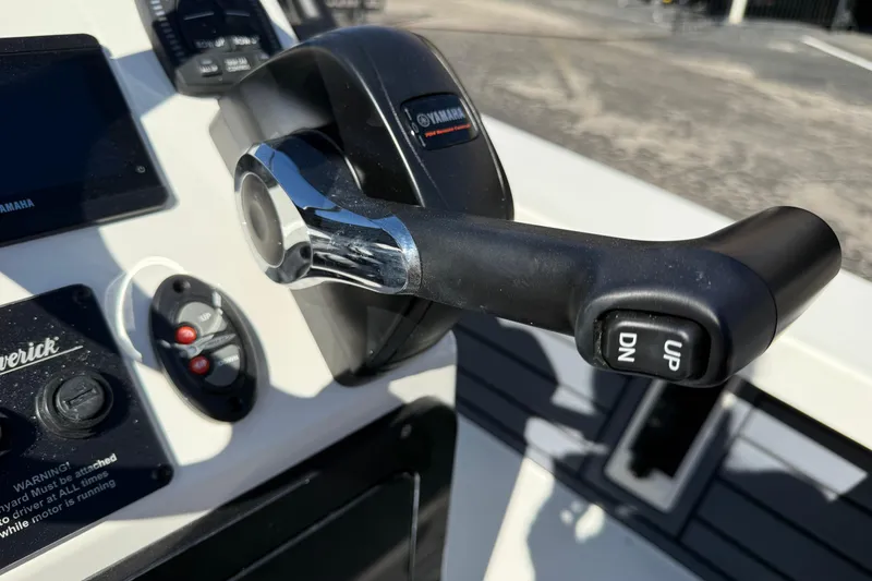Slide: The Image of Close-up of 2026 Maverick 17 HPX-S boat throttle control with Yamaha branding. - 12