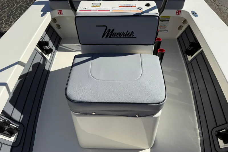 Slide: The Image of 2026 Maverick 17 HPX-S boat interior with cushioned seating and storage. - 18