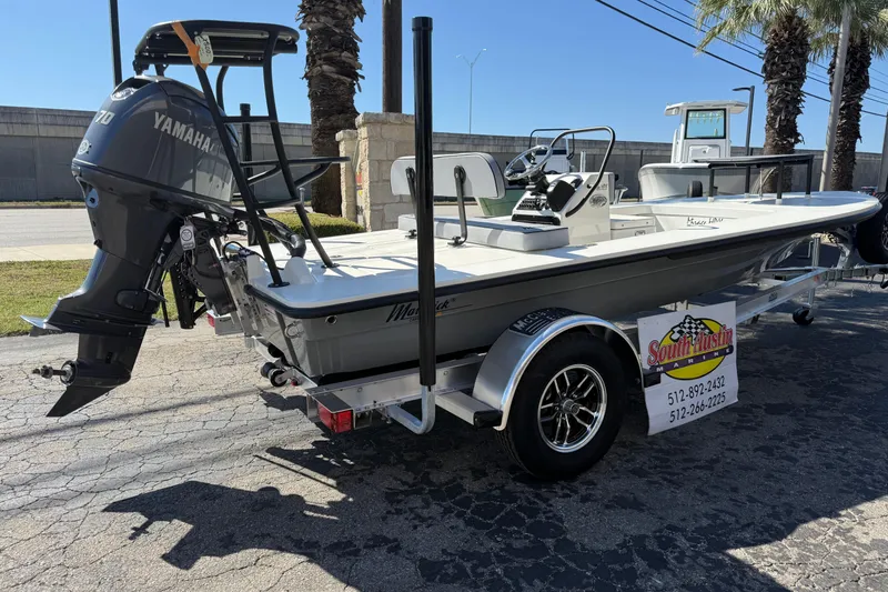 Slide: The Image of 2026 Maverick 17 HPX-S boat with Yamaha engine on trailer, displayed outdoors. - 2