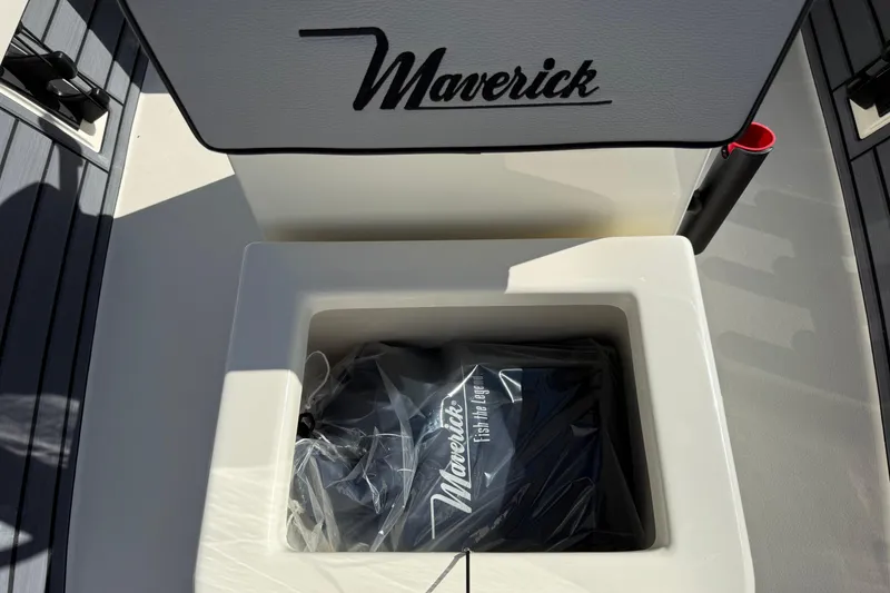 Slide: The Image of 2026 Maverick 17 HPX-S boat storage compartment with branded bag inside. - 21