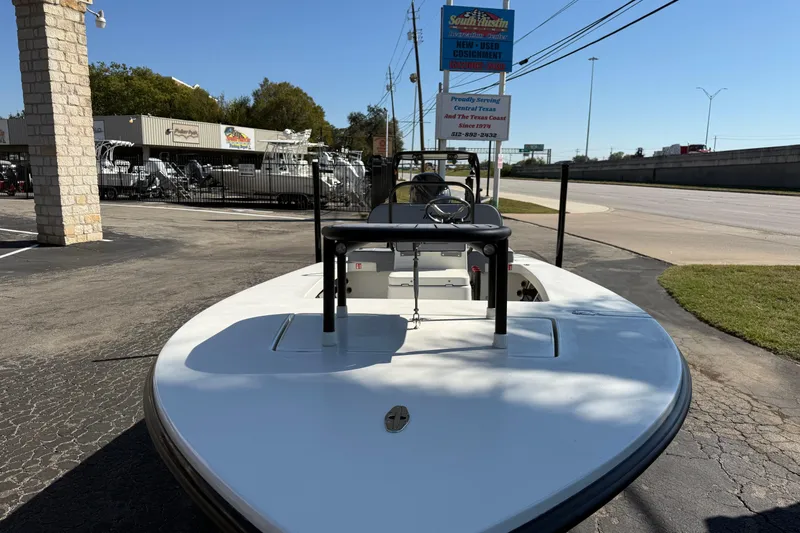 Slide: The Image of 2026 Maverick 17 HPX-S boat displayed at dealership, sunny day, outdoor setting. - 23