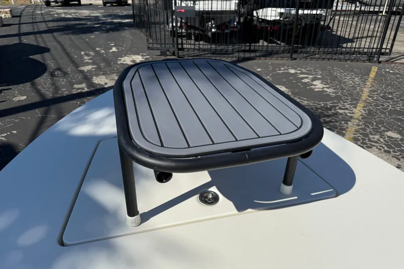 Slide: The Image of 2026 Maverick 17 HPX-S boat deck with elevated platform in a parking lot. - 25