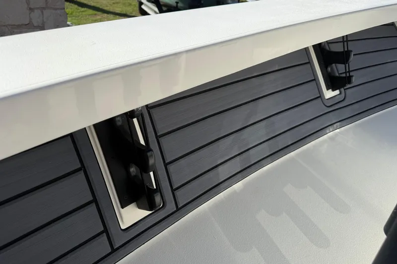 Slide: The Image of 2026 Maverick 17 HPX-S boat detail with sleek, modern design and black paneling. - 28