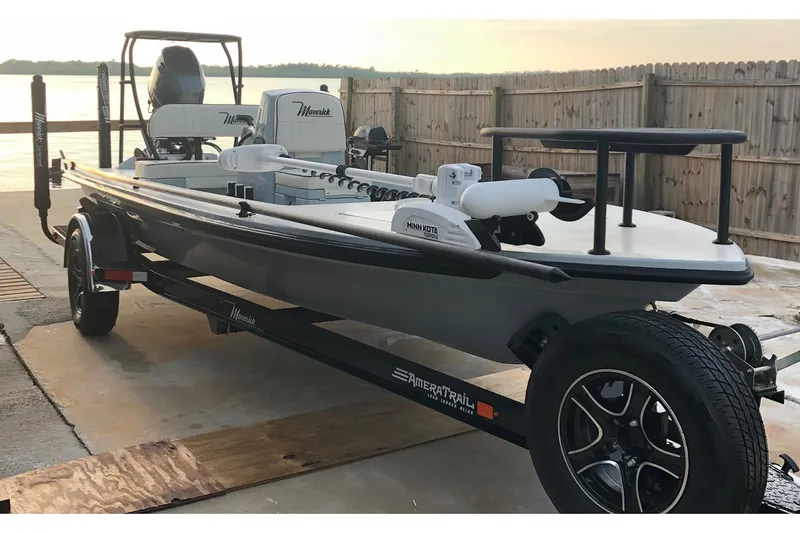 Slide: The Image of Manufacturer Provided Image: 2026 Maverick 17 HPX-S boat on trailer by waterfront, featuring sleek design and modern equipment. - 43