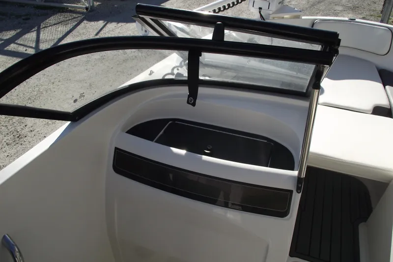 Slide: The Image of 2022 Bayliner VR4 Bowrider OB interior with seating and windshield detail. - 16