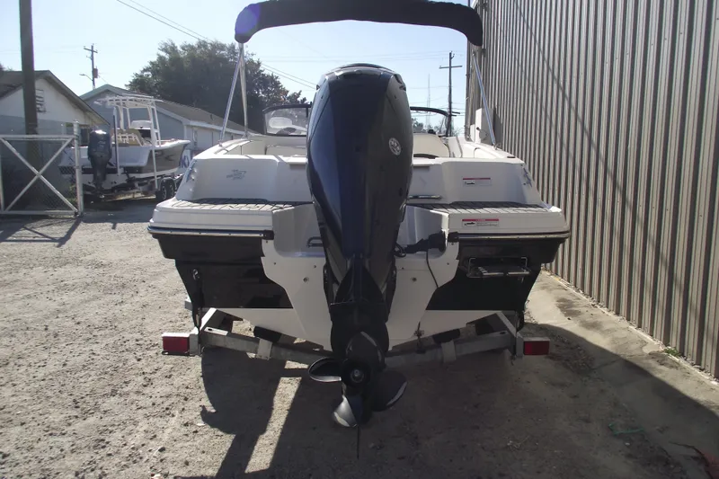 Slide: The Image of 2022 Bayliner VR4 Bowrider OB on trailer, rear view with outboard motor. - 3