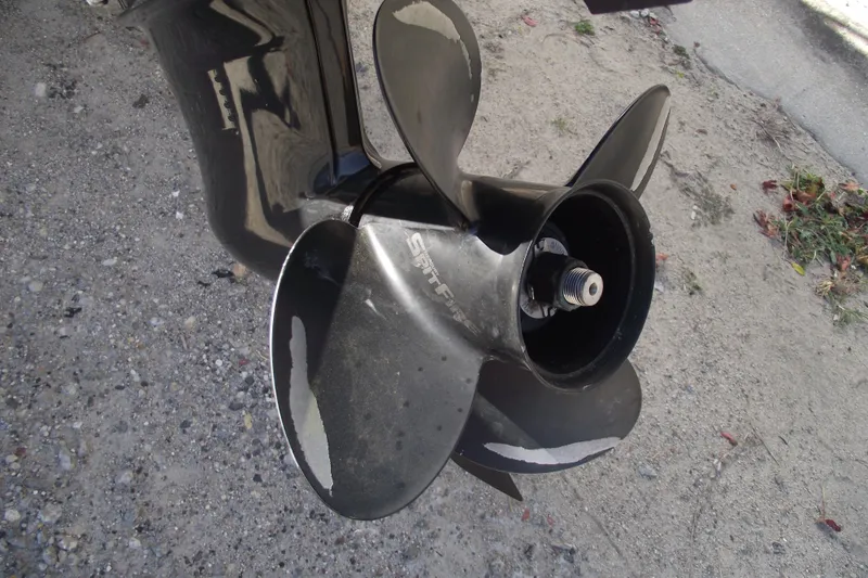 Slide: The Image of 2022 Bayliner VR4 Bowrider OB propeller, showing wear and tear. - 5