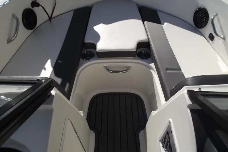 Slide: The Image of 2022 Bayliner VR4 Bowrider OB interior with seating and cup holders. - 7