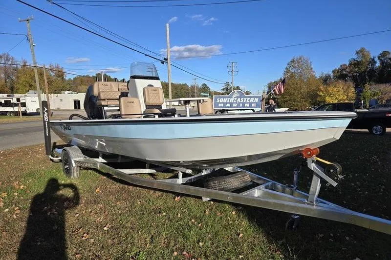 Slide: The Image of Avid 21 Fusion 2026 boat on trailer at Southeastern Marine dealership. - 7