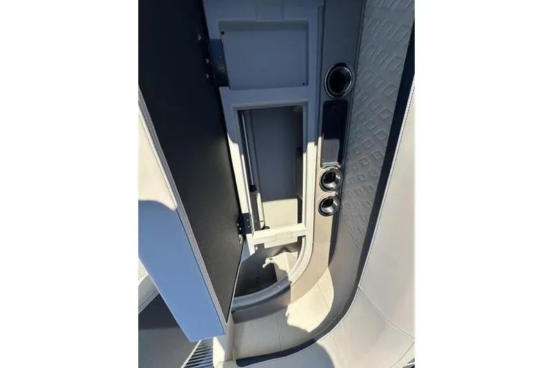 Slide: The Image of 2026 Bennington M Swingback 24 MSB interior with luxurious seating and modern helm. - 13