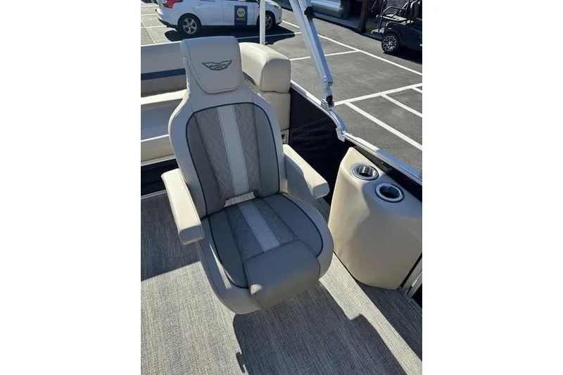 Slide: The Image of 2026 Bennington M Swingback 24 MSB interior with red LED lighting and cushioned seating. - 22