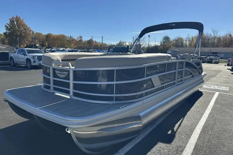 Slide: The Image of 2026 Bennington M Swingback 24 MSB pontoon boat with outboard motor and canopy. - 6