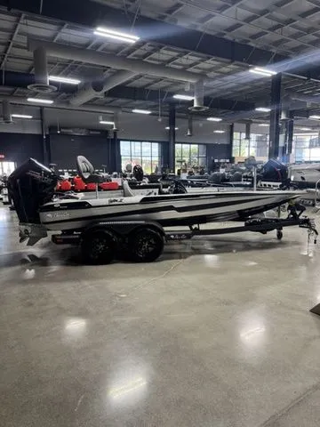 The Image of 2026 Bass Cat Pantera II boat in showroom, sleek design, black and white color scheme. - 1