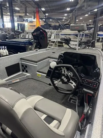 Slide: The Image of 2026 Bass Cat Pantera II boat interior with modern dashboard and seating. - 5