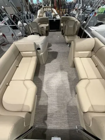 Slide: The Image of 2026 Godfrey Pontoons Xperience 2286 SBX interior with beige seating and spacious layout. - 3