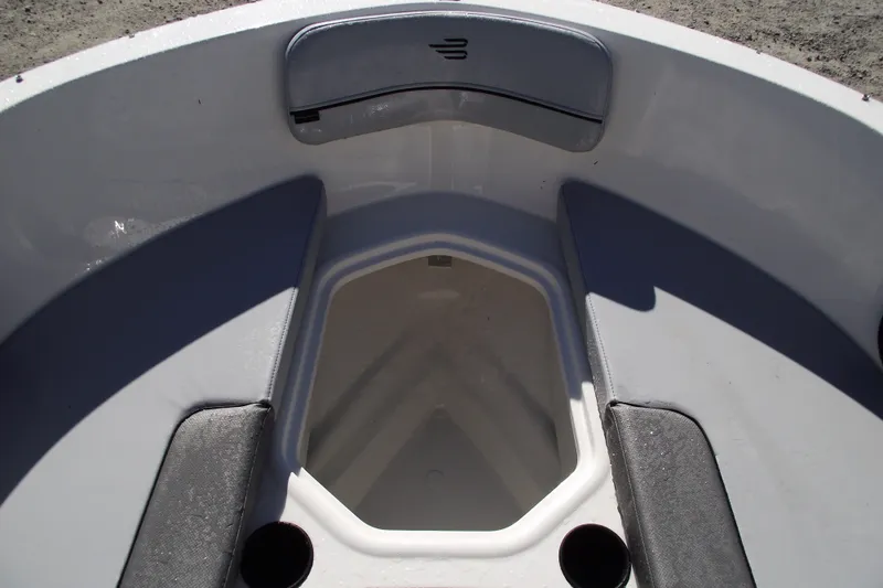 Slide: The Image of 2026 Bayliner VR4 Bowrider OB interior, featuring spacious bow seating and storage. - 10