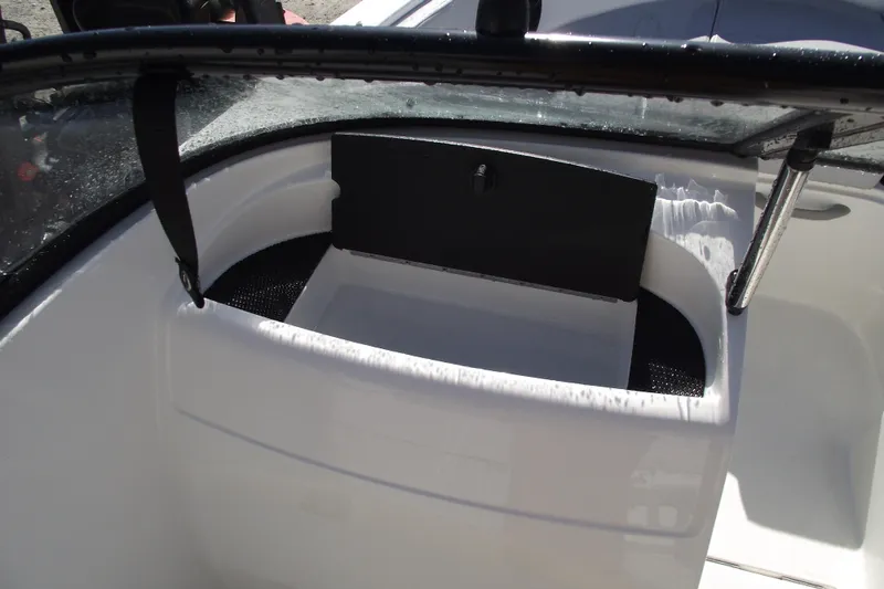 Slide: The Image of 2026 Bayliner VR4 Bowrider OB interior storage compartment detail. - 17