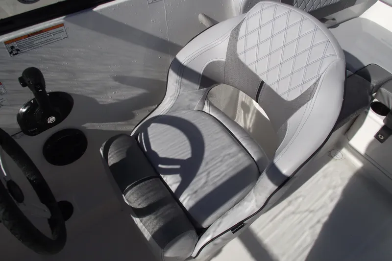 Slide: The Image of 2026 Bayliner VR4 Bowrider OB cockpit seat with modern design and comfortable upholstery. - 21