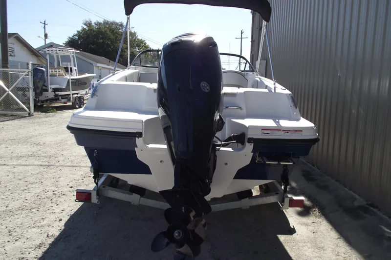 Slide: The Image of 2026 Bayliner VR4 Bowrider OB with outboard motor. - 3