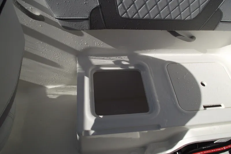 Slide: The Image of 2026 Bayliner VR4 Bowrider OB interior storage compartment. - 32