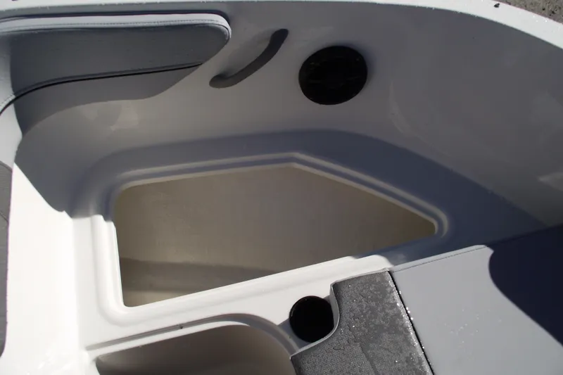 Slide: The Image of 2026 Bayliner VR4 Bowrider OB interior storage compartment, featuring sleek design and functionality. - 8