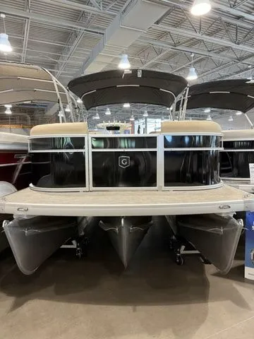 The Image of 2026 Godfrey Pontoons Xperience 2286 SBX Sport Tube on display in showroom. - 1