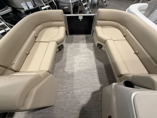 Slide: The Image of 2026 Godfrey Pontoons Xperience 2286 SBX interior with beige seating and carpeted floor. - 12