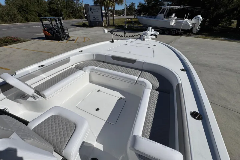 Slide: The Image of 2026 Caymas 28 HB boat with spacious seating and modern design. - 18