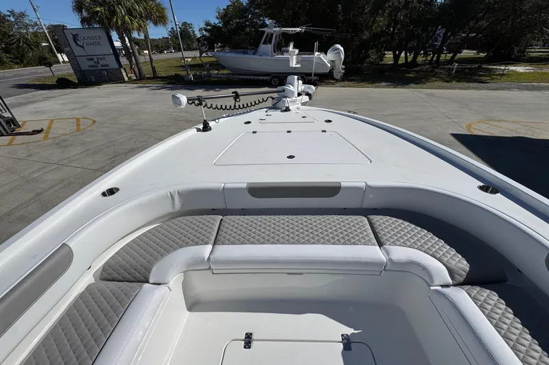 Slide: The Image of 2026 Caymas 28 HB boat with spacious seating and modern design. - 19