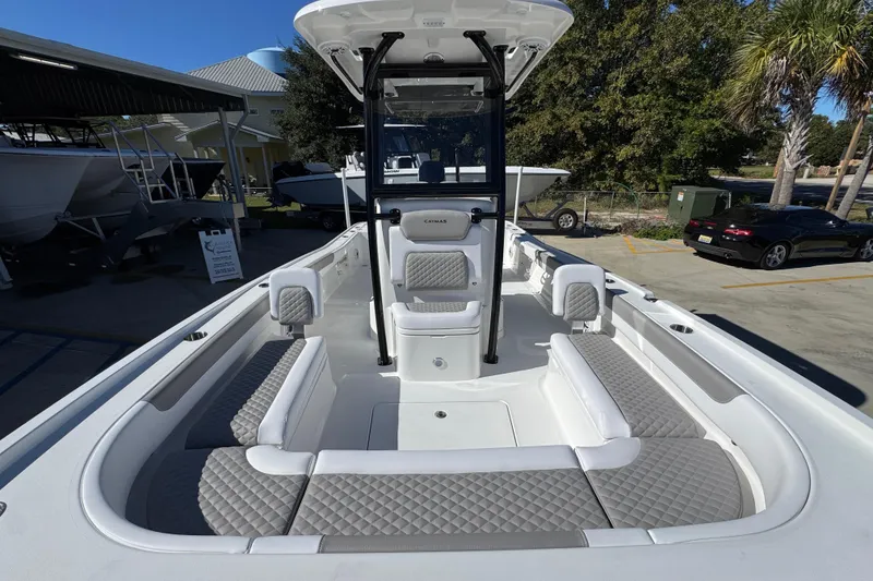 Slide: The Image of 2026 Caymas 28 HB boat interior with cushioned seating and modern design. - 24