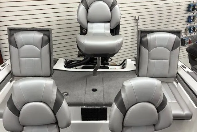 Slide: The Image of 2026 Nitro ZV20 Sport Pro boat interior with five gray and black cushioned seats. - 14