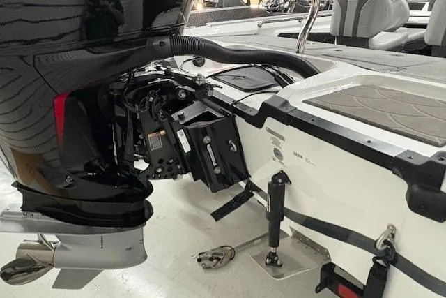 Slide: The Image of 2026 Nitro ZV20 Sport Pro boat engine and transom detail in showroom. - 5