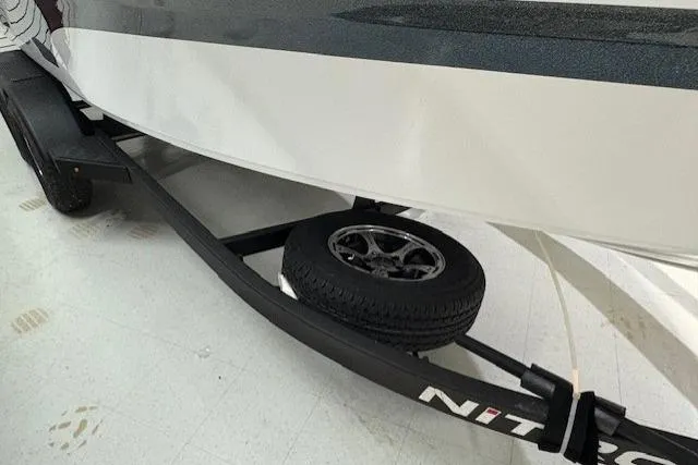 Slide: The Image of 2026 Nitro ZV20 Sport Pro boat on trailer with spare tire. - 7