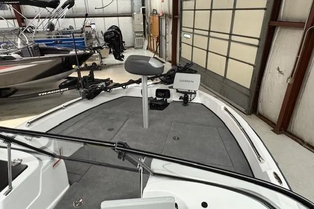 Slide: The Image of 2026 Nitro ZV19 Pro boat interior with Garmin equipment in a garage setting. - 10