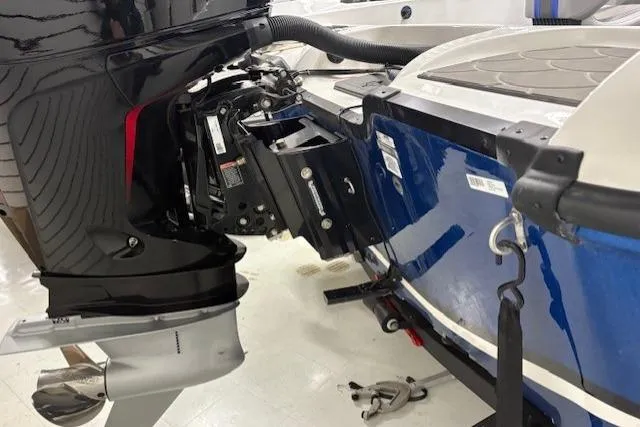 Slide: The Image of 2026 Nitro ZV19 Pro boat engine and transom detail in a showroom setting. - 4