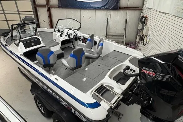 Slide: The Image of 2026 Nitro ZV19 Pro boat with Mercury engine, featuring spacious seating and modern design. - 6